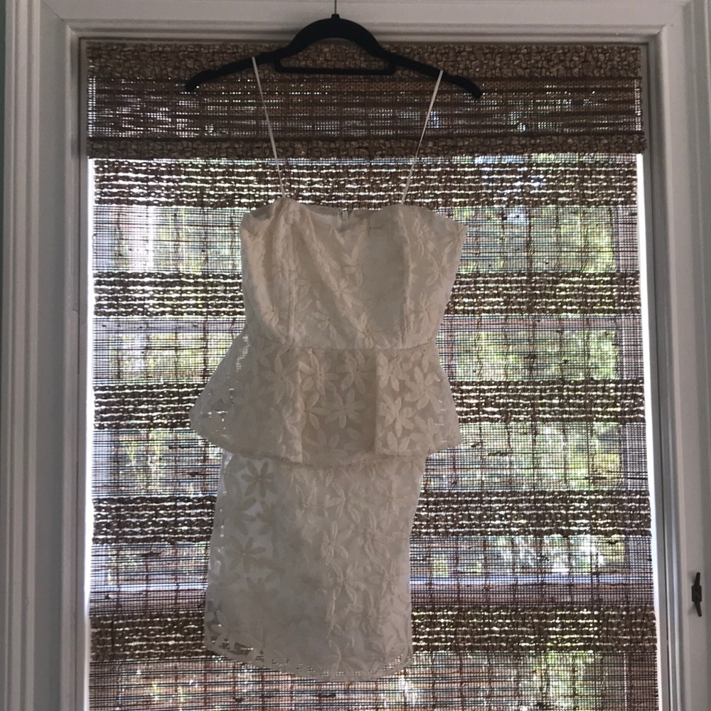 Staples off white dress with flowers.